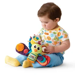 Lamaze Riikinkukko värikäs vauvan lelu